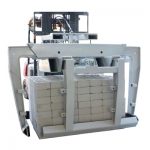 Dubbelarmad block och tegelklämma